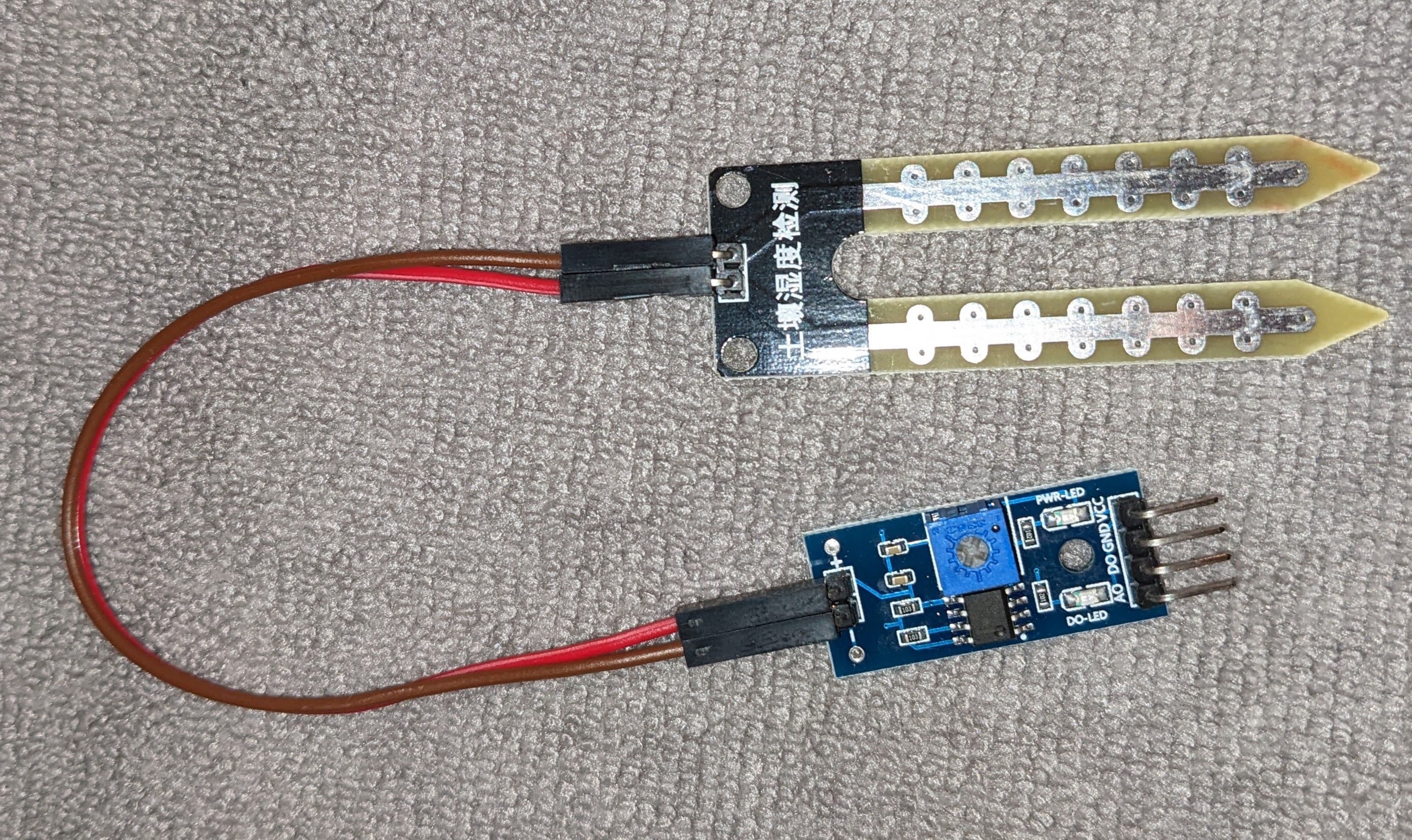LM393 connected to a typical moisture sensing blade
